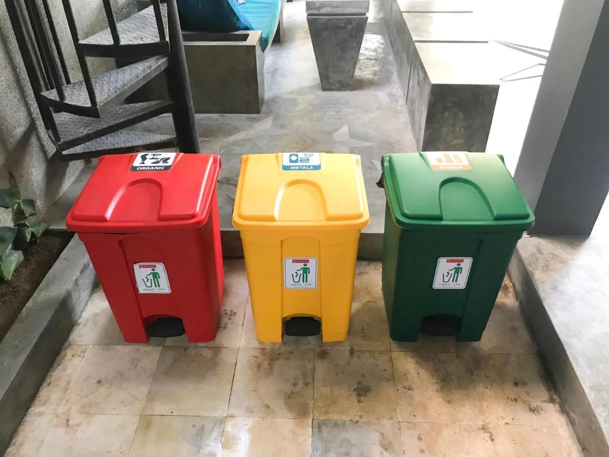 Stellar Capsules Hostel Seminyak Kültér fotó Waste bins for recycling in a university